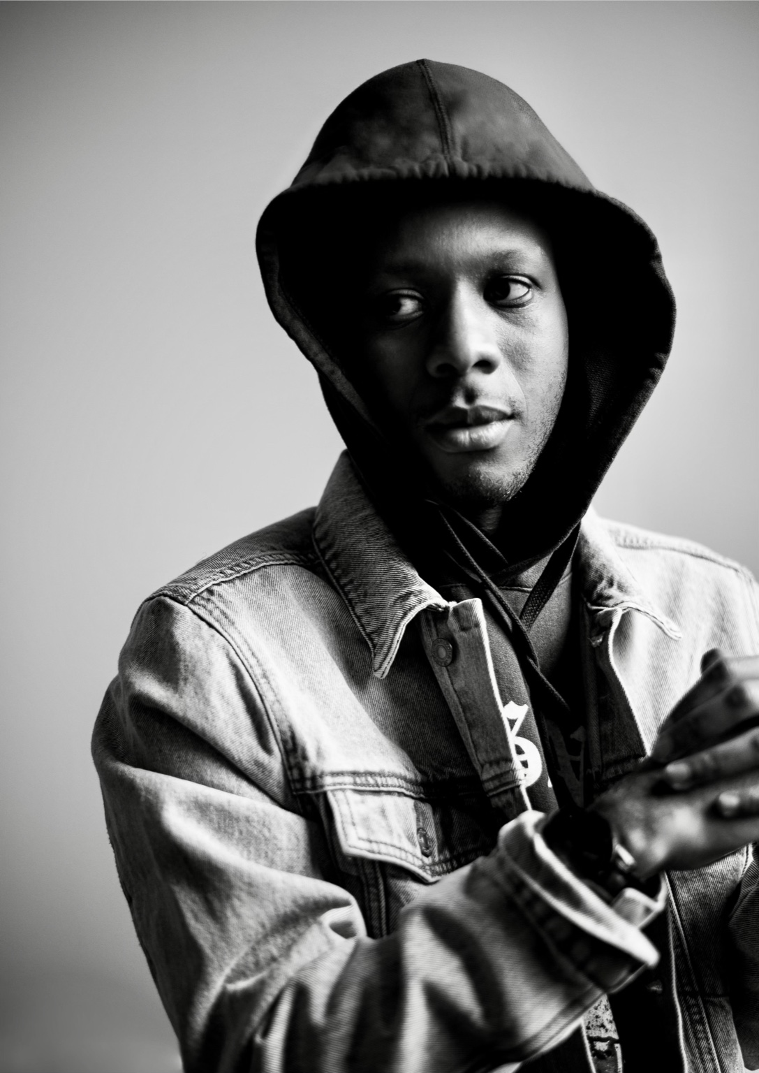 Keenan Laurino in hoodie, black and white portrait